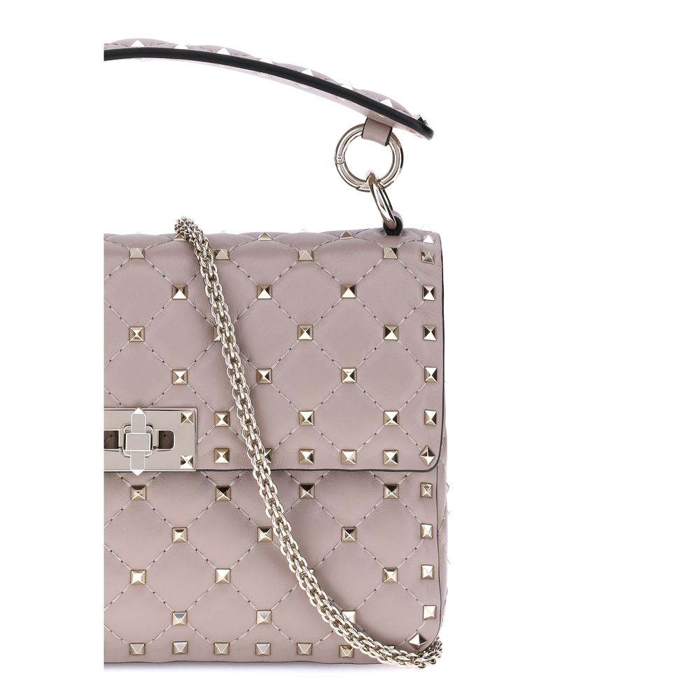 Valentino Garavani Medium Rockstud Spike Shoulder Bag in diamond-quilted leather with gold studs and chain strap.
