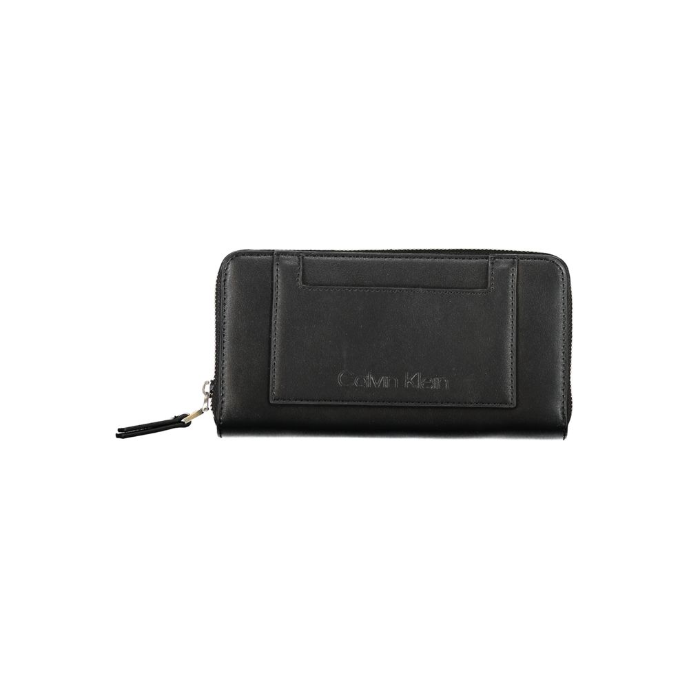Calvin Klein Black Polyester Wallet with contrasting details, zip closure, logo, 5 compartments, card spaces, and coin purse.