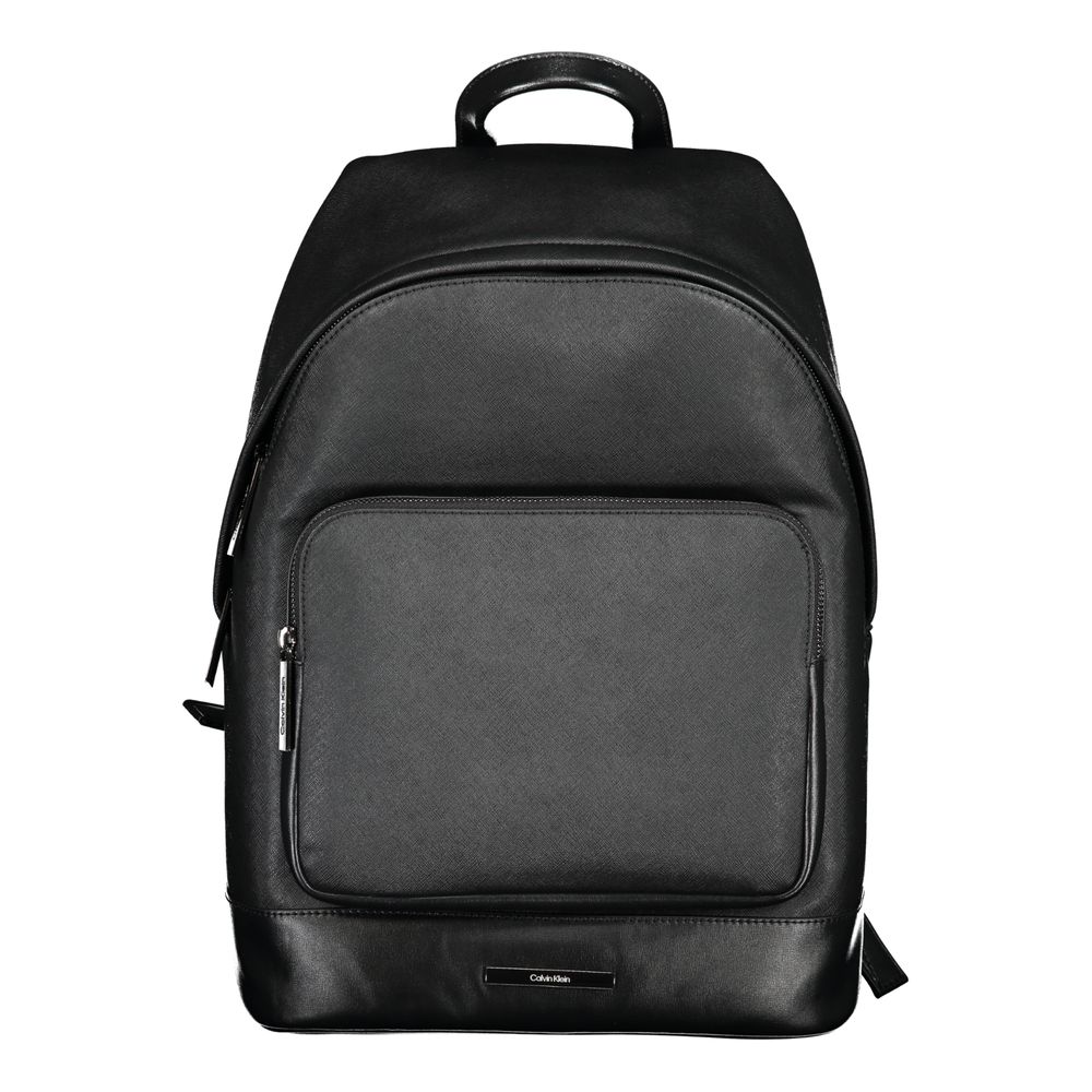 Calvin Klein Black Polyester Backpack with adjustable straps, external and internal pockets, laptop compartment, and zip closure.