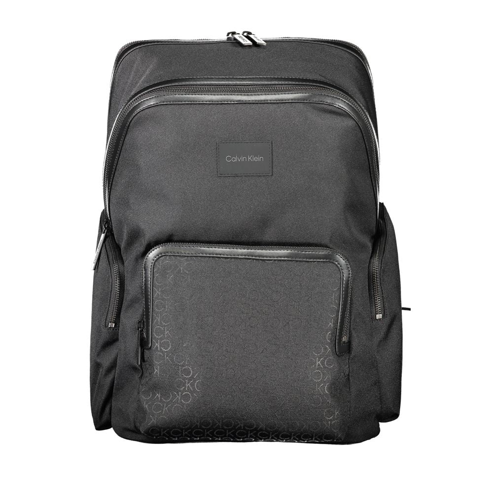 Calvin Klein Black Polyester Backpack with adjustable straps, laptop compartment, external pockets, and contrasting details.