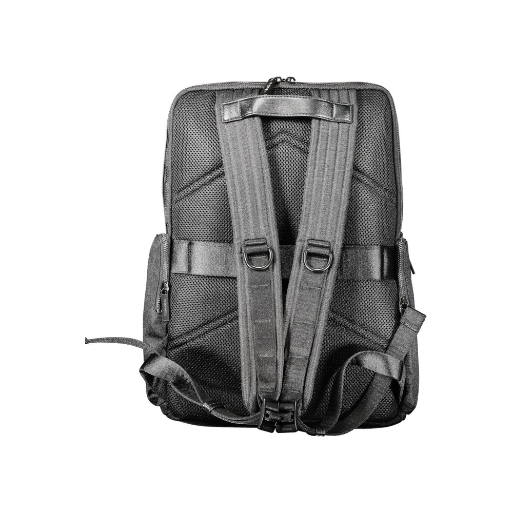 Back view of Calvin Klein Black Polyester Backpack with adjustable straps, contrasting details, and logo. Made from 95% recycled polyester.