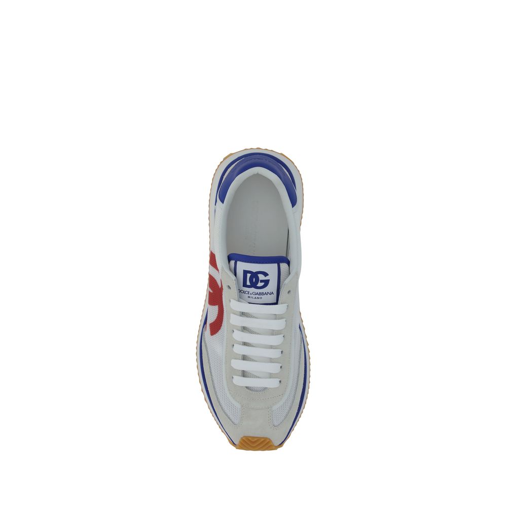 Top view of Dolce & Gabbana Multicolor Rubber Low Top Sneakers with monogram heel and suede details.