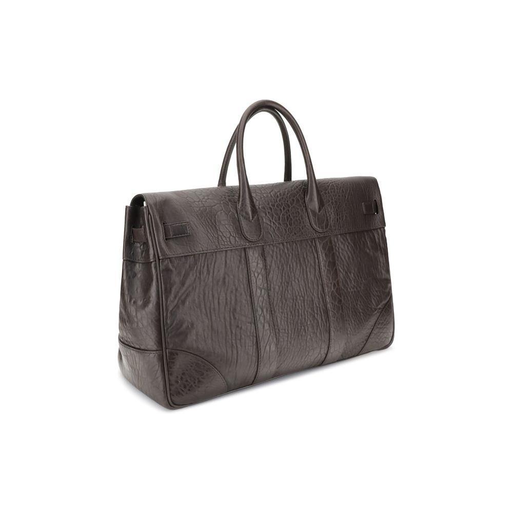 Front view with bag zipped and handles upright.