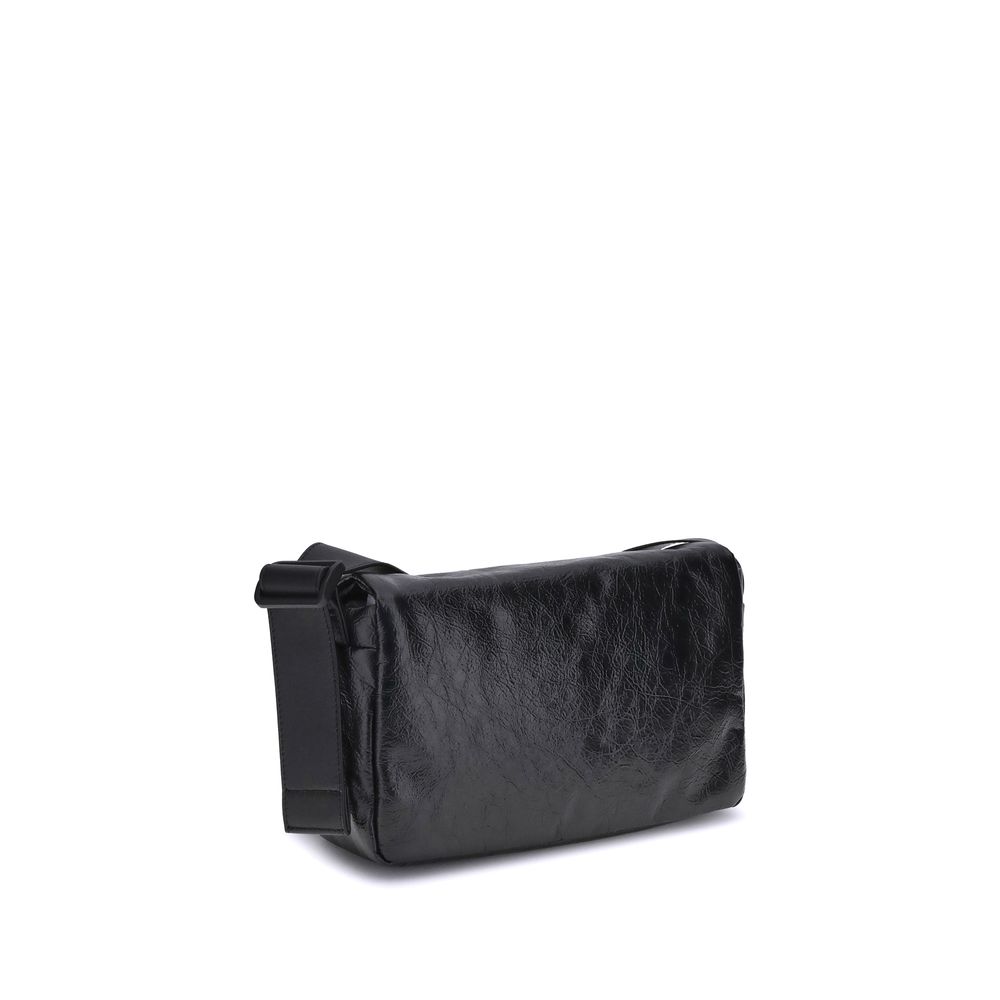 Balenciaga Black Calf Leather Bos Taurus Shoulder Bag with adjustable strap and magnetic flap on a white background.