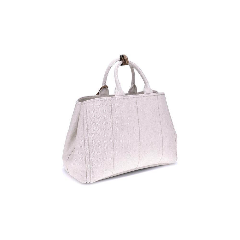 Front view with bag zipped and handles upright.