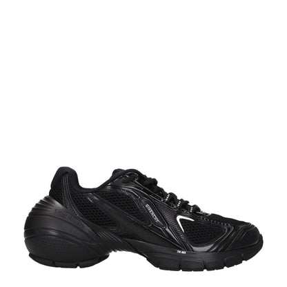 Givenchy Black Fabric Athletic Sneakers featuring lace-up closure, logos, rubber sole, and round toe design, side view.