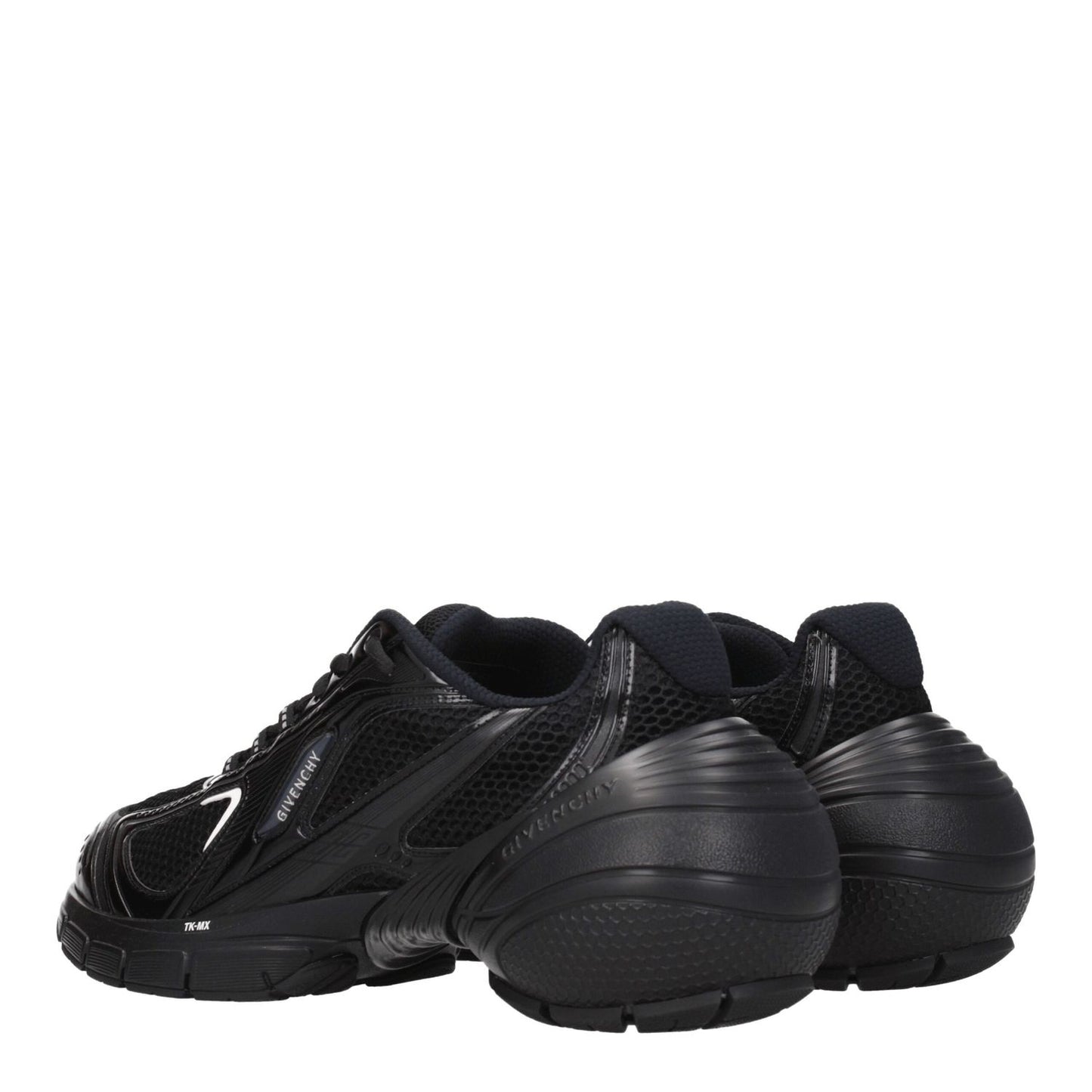 Givenchy Black Fabric Athletic Sneakers with logos, lace-up closure, rubber sole, mid heels, and round toe, rear side view.
