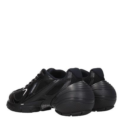 Givenchy Black Fabric Athletic Sneakers with logos, lace-up closure, rubber sole, mid heels, and round toe, rear side view.