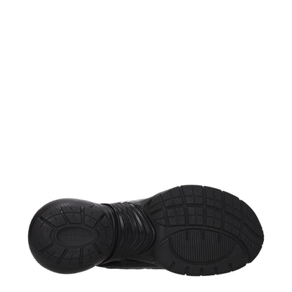 Sole view of Givenchy Black Fabric Athletic Sneakers with rubber sole and round toe.