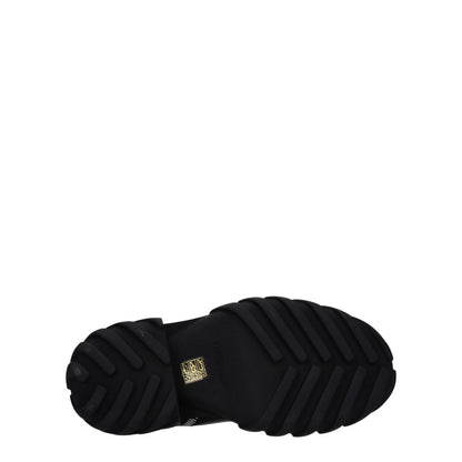 Sole view of Off-White Black Leather Ankle Boots with rubber tread design.