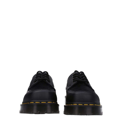 Dr. Martens Black Leather Oxfords And Derbies, casual style, square toe, rubber sole, lace up closure, side view.