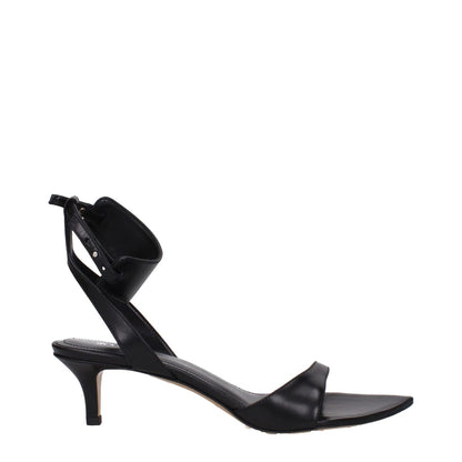 Isabel Marant Black Leather Sandals with buckle closure, open toe design, and mid heels, perfect for elegant occasions.