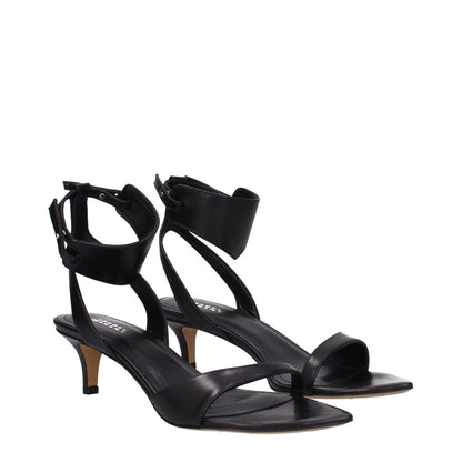 Isabel Marant Black Leather Sandals with buckle closure and mid heels.