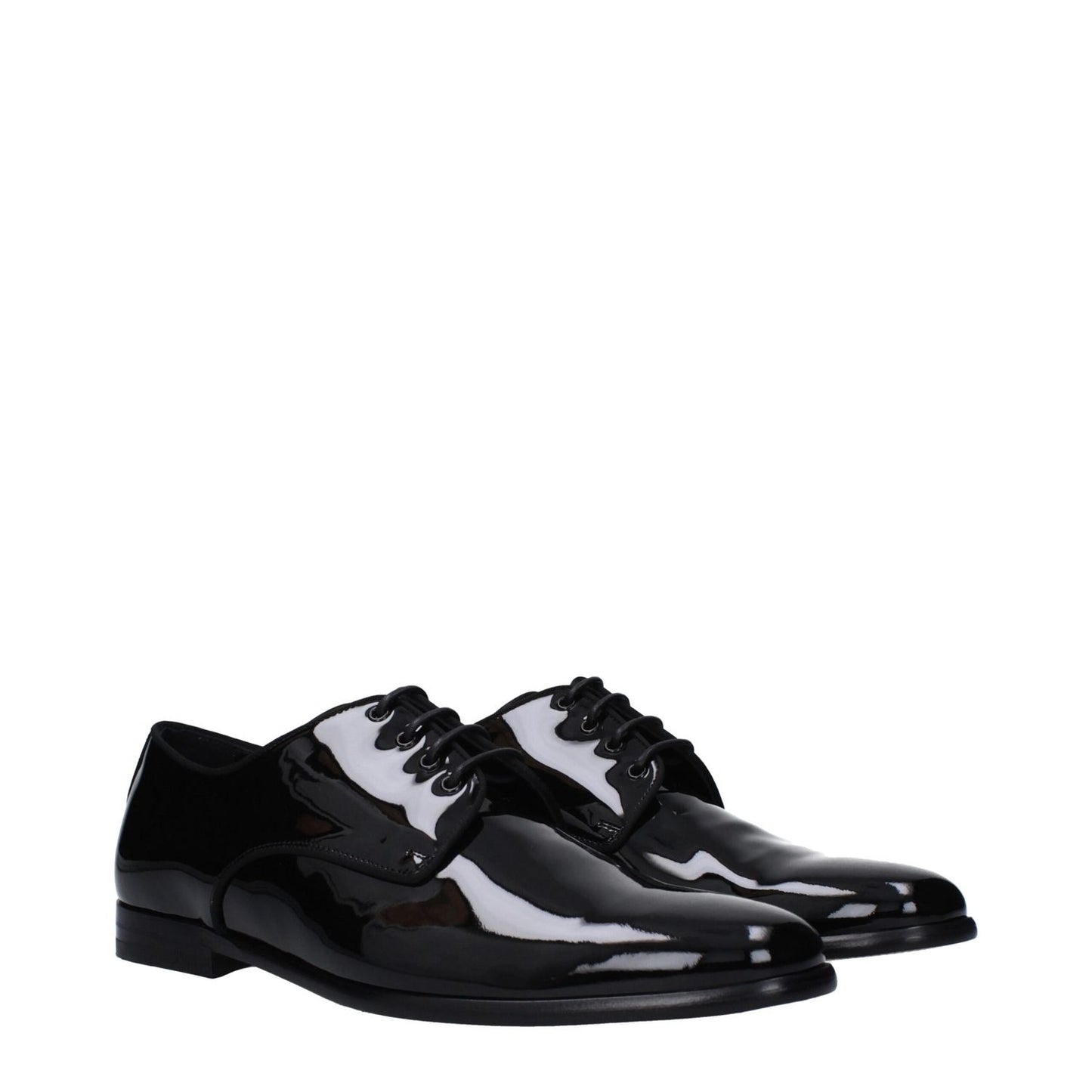 Dolce & Gabbana Black Leather Oxfords And Derbies lace-up shoes with patent finish, pointy toe, low flat heel, and leather sole.