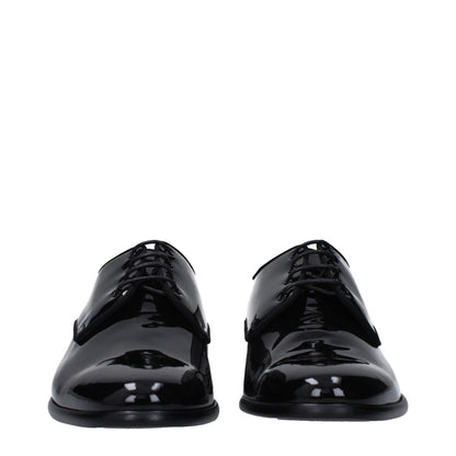 Dolce & Gabbana Black Leather Oxfords And Derbies, pointy toe, lace-up casual style, flat heel, patent leather design.