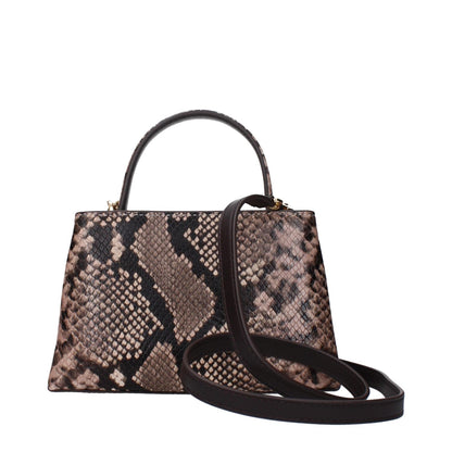 Snakeskin handbag with a top handle and removable strap