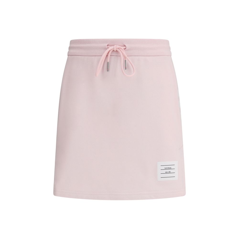 Thom Browne Multicolor Cotton Mini Skirt with drawstring waist and logo patch, featuring signature side bands and front slits for AW25.