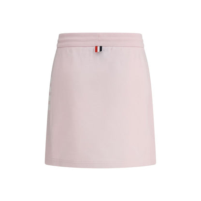 Thom Browne Multicolor Cotton Mini Skirt with drawstring waistband and logo patch, showcasing front slits and signature side bands.