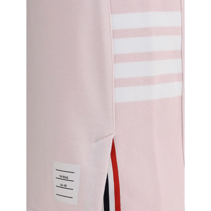 Close-up of Thom Browne Multicolor Cotton Mini Skirt showing front slit with multicolored bands, logo patch, and side bands.