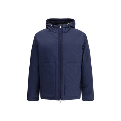 Moncler x Donald Glover Blue Goose Down Full-Length Jacket with adjustable hood and orange logo patch.