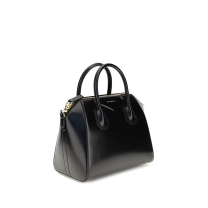 Givenchy Black Calf Leather Bos Taurus Handbag with gold embossed logo and zipper closure.