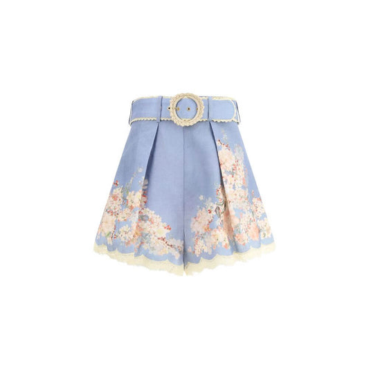 Zimmermann Light Blue Linen Bermuda Shorts with floral print, featuring belted waist and pleats, perfect for a stylish summer look.