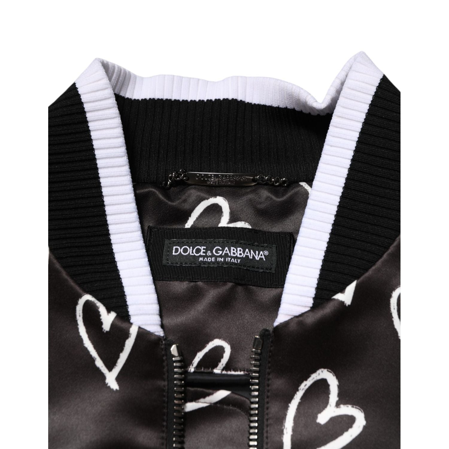 Front view with bag zipped and handles upright.