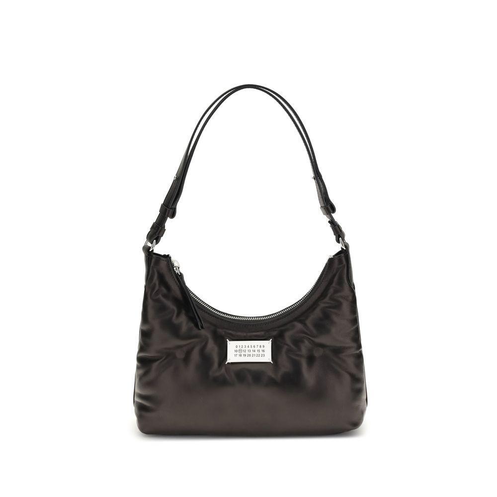 Front view with bag zipped and handles upright.