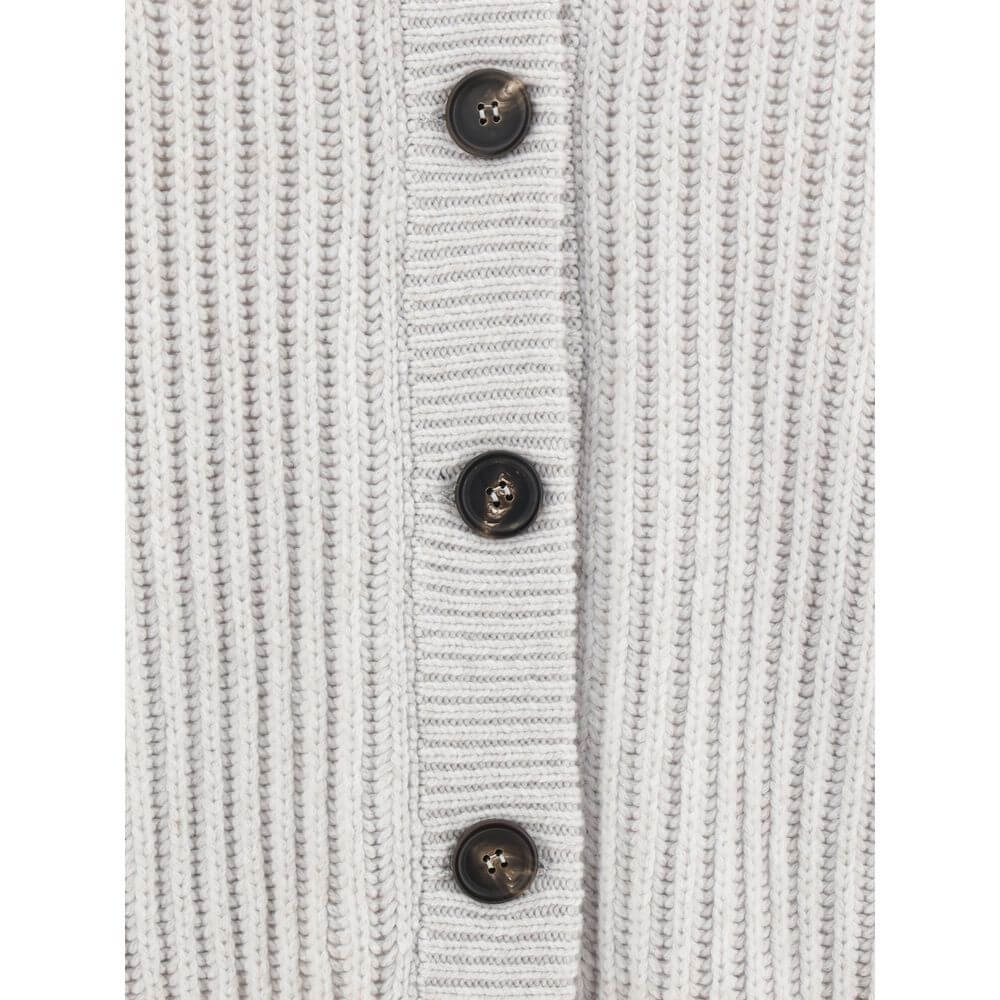 Close-up of Brunello Cucinelli White Cashmere Cardigan showcasing ribbed texture and front buttons.
