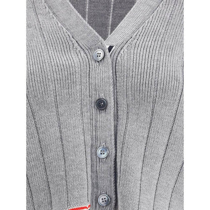 Thom Browne Gray Fleece Wool Cardigan with ribbed design and button closure, featuring iconic colored bands on hem and cuffs.