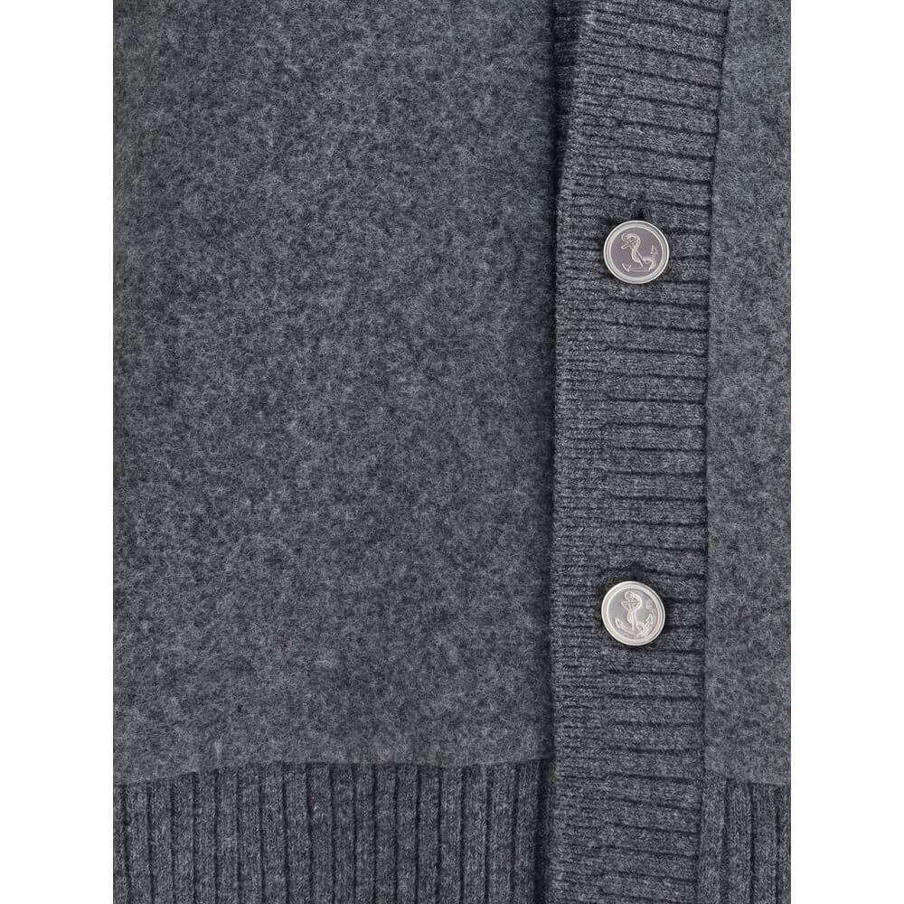 Close-up of Thom Browne Gray Wool Cardigan with ribbed detailing and button closure.