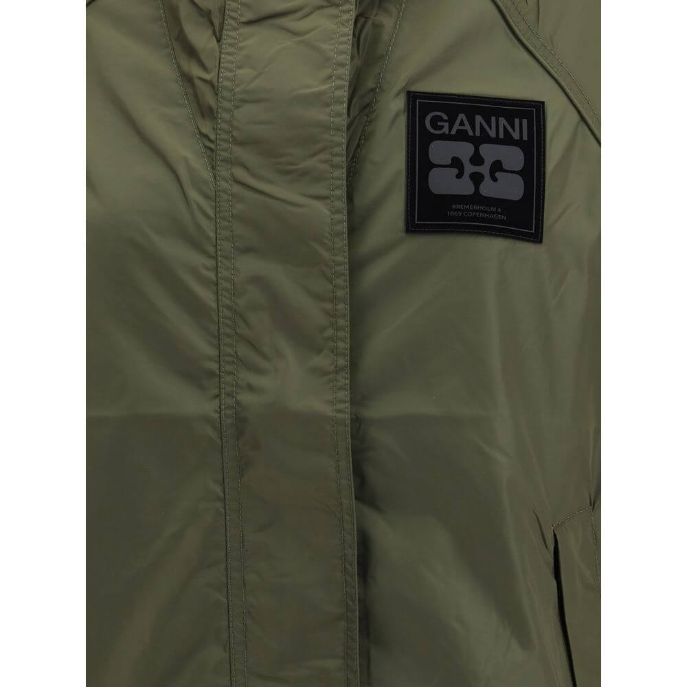 Ganni Green Nylon Shell Jacket with front zipper, hood, and GANNI logo patch on chest, showcasing contemporary waterproof style.