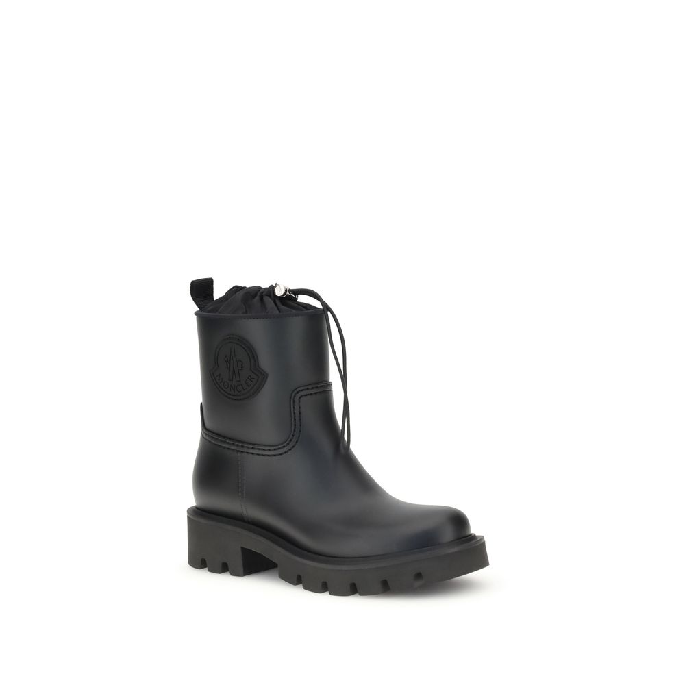 Moncler Black Rubber Lace-Up Boots with logo applique and drawstring closure for adjustable fit, perfect for all conditions.