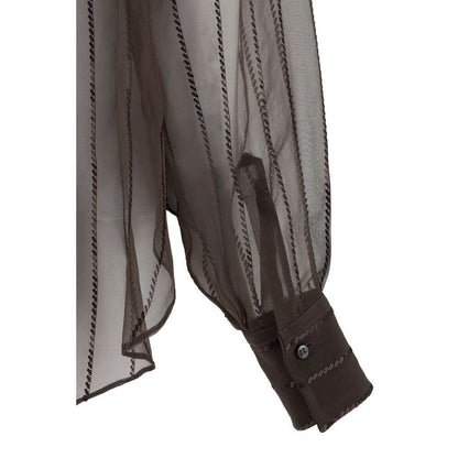 Close-up of Brunello Cucinelli Brown Silk Blouse showing semi-transparent sleeve and adjustable button cuff detail.