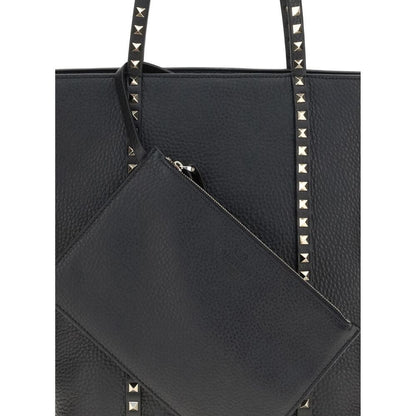 Valentino Garavani Black Calf Leather Bos Taurus Shoulder Bag with Rockstud accents and removable pouch.