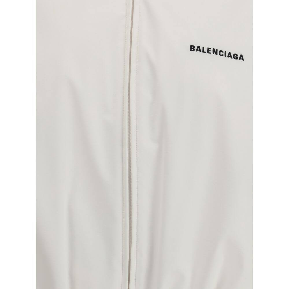 Close-up view of Balenciaga White Polyester Shell Jacket with logo embroidery, highlighting high-quality technical fabric.