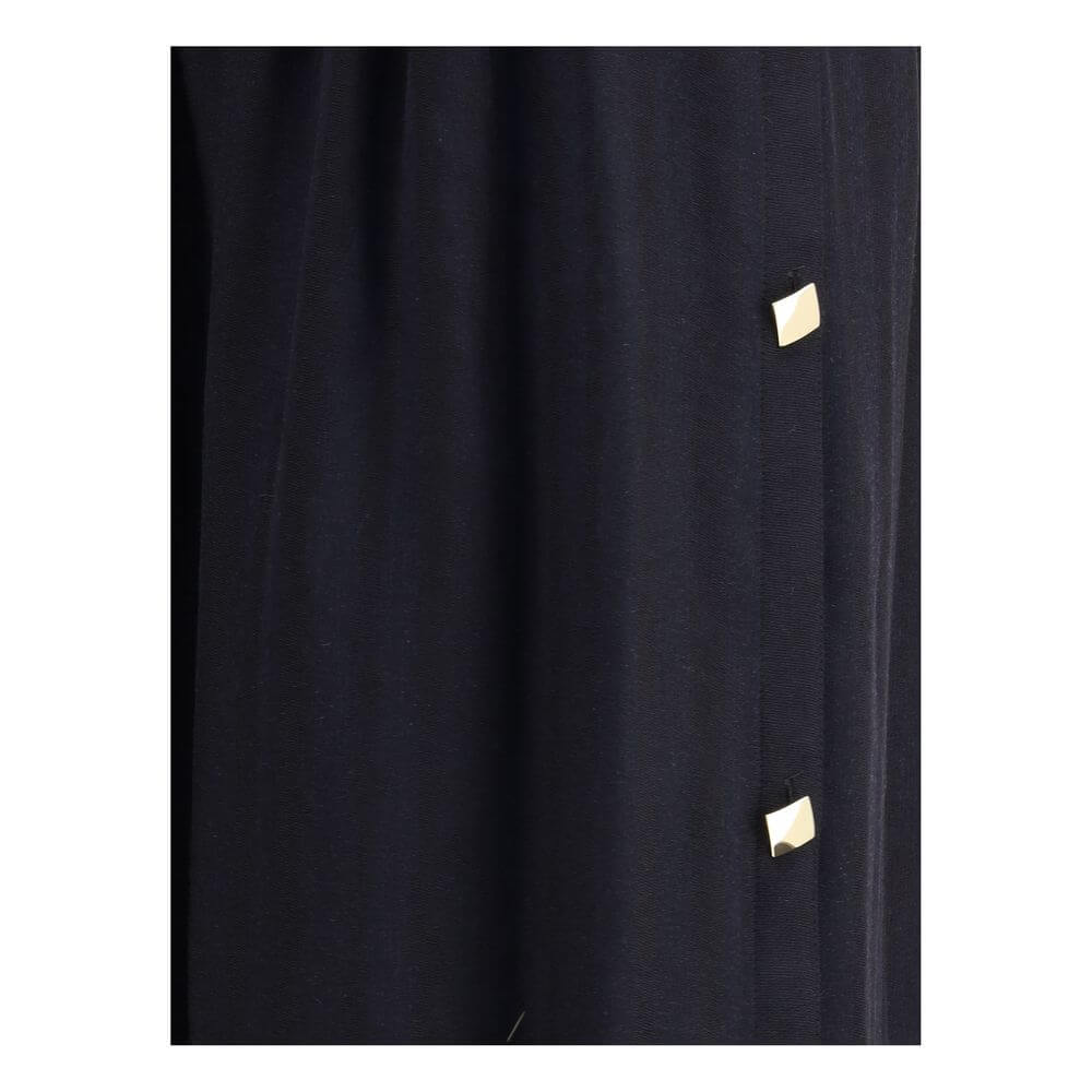 Close-up of Kristina Ti Black Fleece Wool Long Skirt with golden geometric buttons and elegant design.