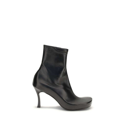 Balenciaga Black Calf Leather Bos Taurus Ankle Boots featuring ergonomic insole and embossed logos, side view.