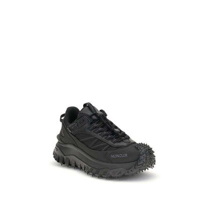 Moncler Black Calf Leather Bos Taurus Athletic Sneakers showcasing technical performance and contemporary style