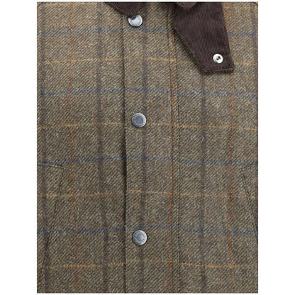 Close-up of Barbour Green Wool Coat with check pattern, corduroy collar, and snap buttons, showcasing timeless British style and craftsmanship.