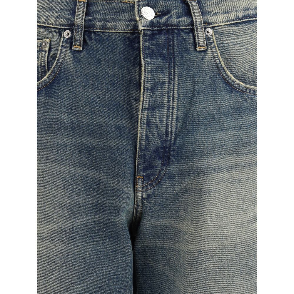 Alt Tag: Sunflower Blue Cotton Jeans Denim with vintage dye effect and twisted design, showcasing sustainable fashion details.