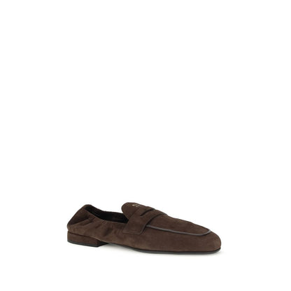 Prada Brown Lamb Ovis Aries Aries Slip-On Loafers with suede and leather horsebit upper, featuring rubber sole and screen-printed logo.