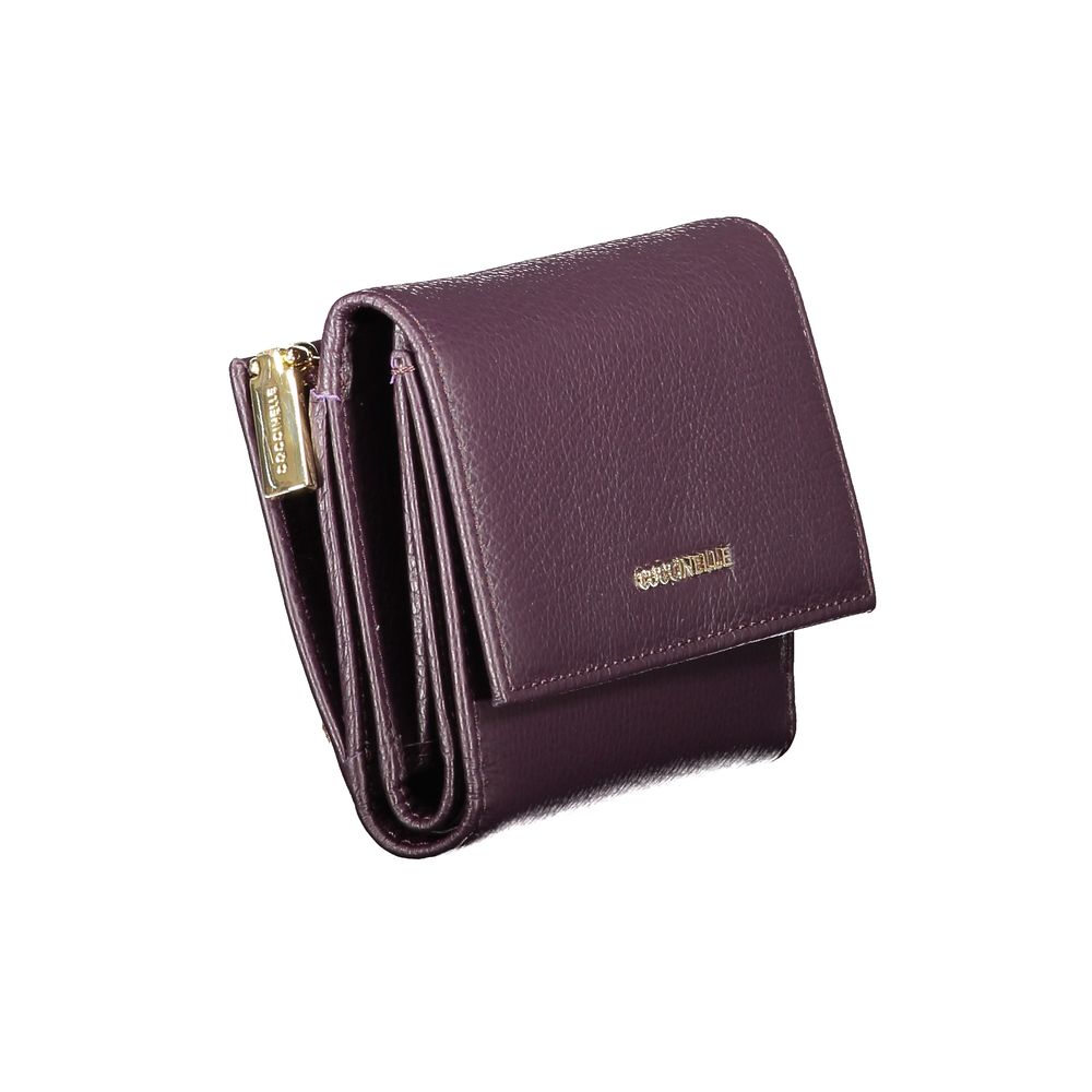 Coccinelle Purple Leather Women Wallet with zip and snap closure, featuring multiple compartments and external coin pocket.