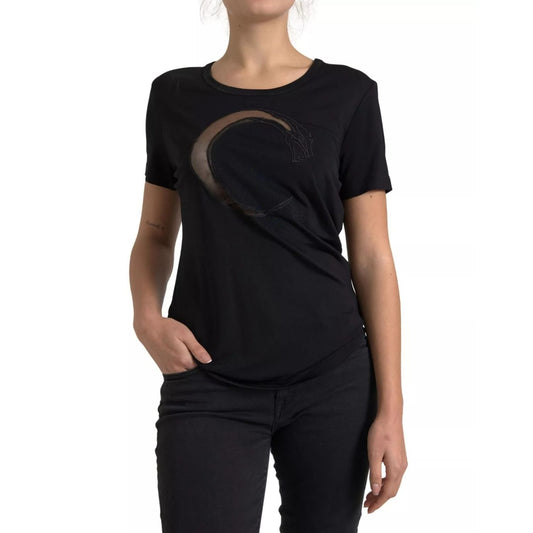 Woman wearing Roberto Cavalli Black Viscose Round Neck CLASS T-shirt with short sleeves, logo decor, made in Italy.