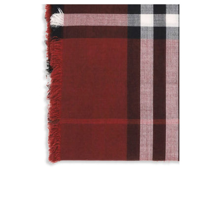 Burberry Red Wool Scarf with reversible check pattern in Oxblood and Post Red, featuring delicate fringes for an elegant look.