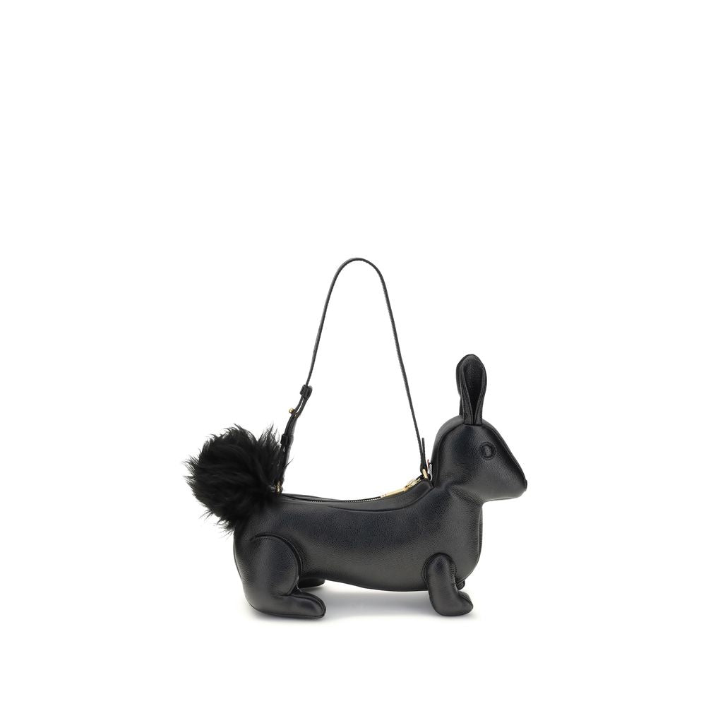 Thom Browne Black Calf Leather Bos Taurus Shoulder Bag shaped like a rabbit with fur tail and brass zipper closure.