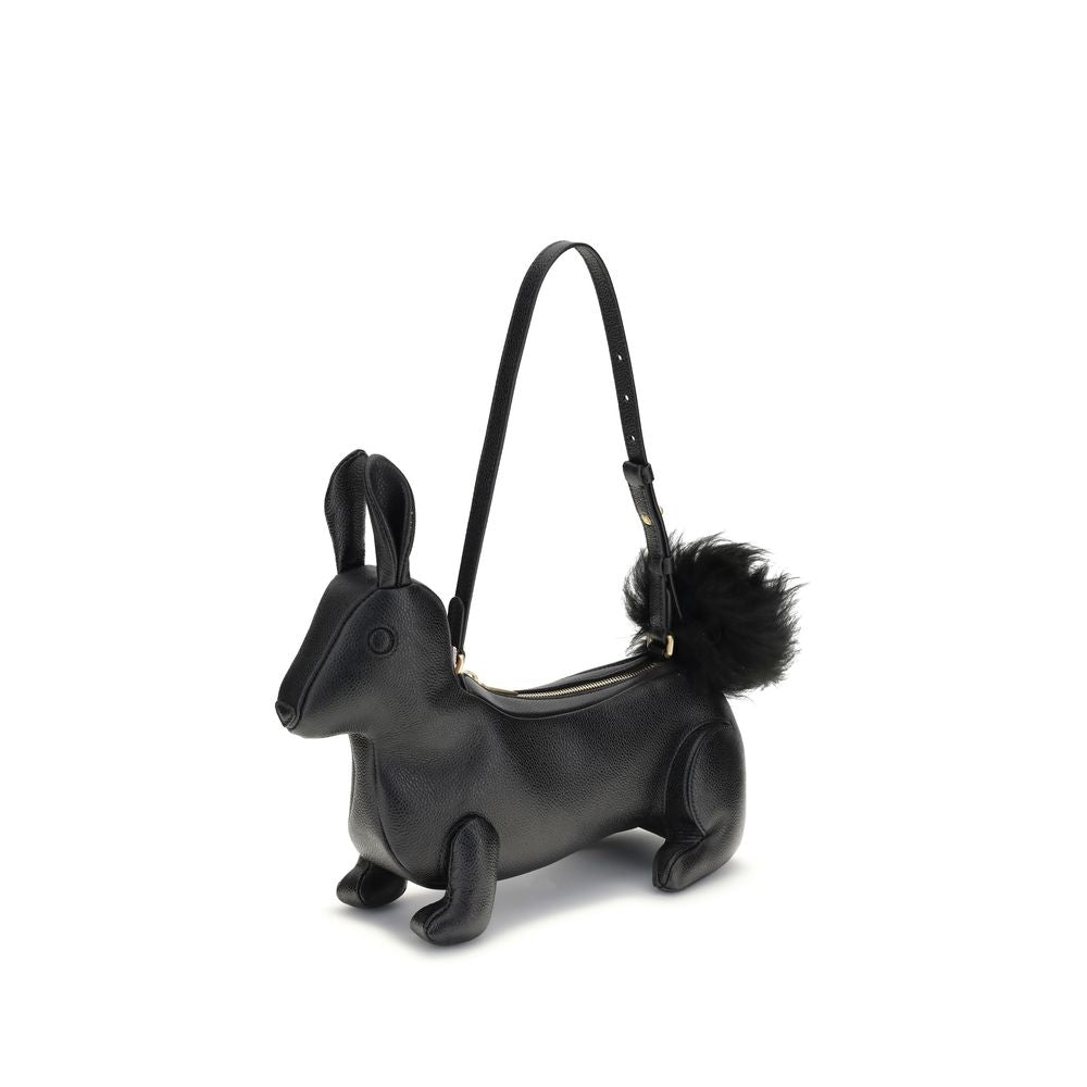 Thom Browne Black Calf Leather Bos Taurus Shoulder Bag with rabbit shape and fur tail, featuring brass zipper and striped interior.