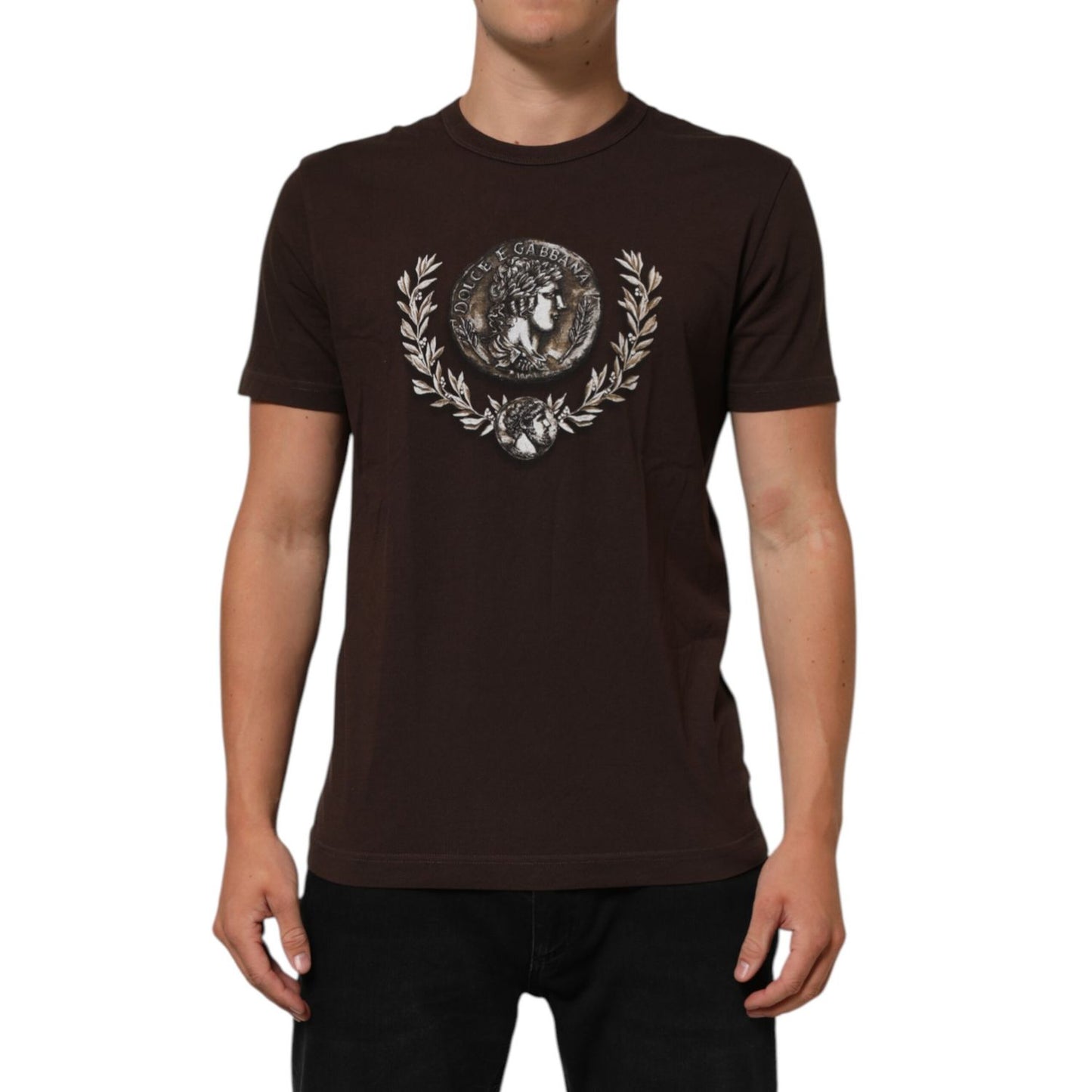 Man wearing Dolce & Gabbana Brown Coin Laurel Print Men Crew Neck T-shirt with intricate design, short sleeves, and regular fit.