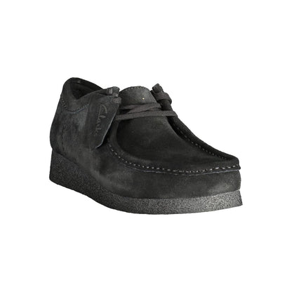 Clarks Black Leather Men Sneaker with suede finish and removable footbed for style and comfort.