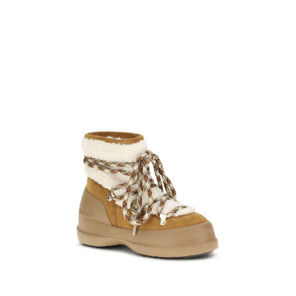 Moon Boot Beige Leather Ankle Boots with shearling and crossover laces, featuring a non-slip sole, AW25 collection.
